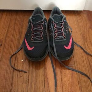 Grey and pink Nike tennis shoes